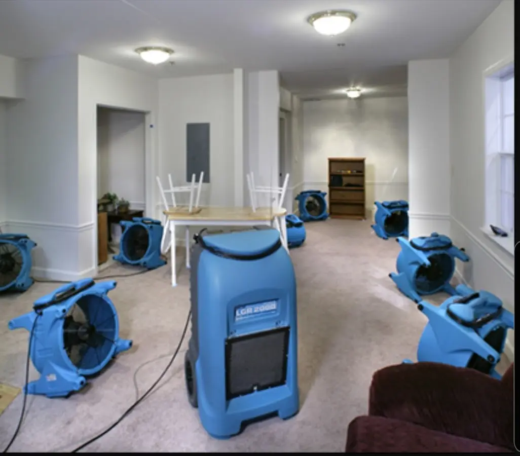 Air movers and dehumidifier setup for Water Extraction & Removal in Clewiston